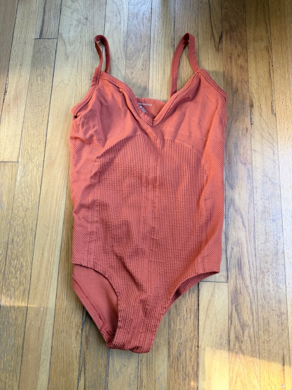 Anthropologie orange body suit